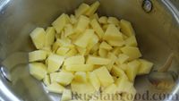 Фото приготовления рецепта: Рассольник с курицей, овощами, консервированной фасолью и кукурузой - шаг №7