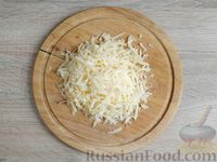 Фото приготовления рецепта: Яичный рулет со шпинатом и сыром (в духовке) - шаг №10
