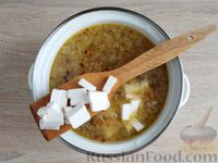Фото приготовления рецепта: Густой куриный суп с фасолью, брокколи и плавленым сыром - шаг №13