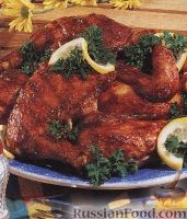 Фото к рецепту: Курятина на гриле под острым соусом