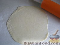 Фото приготовления рецепта: Лепешки, жаренные без дрожжей (казахская кухня) - шаг №8