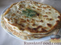 Фото приготовления рецепта: Лепешки, жаренные без дрожжей (казахская кухня) - шаг №11
