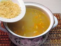 Фото приготовления рецепта: Суп с курицей, лапшой, пшеном и беконом - шаг №14