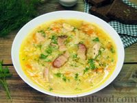 Фото приготовления рецепта: Суп с курицей, лапшой, пшеном и беконом - шаг №17