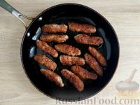 Фото приготовления рецепта: Мититеи (молдавские колбаски из мясного фарша) - шаг №9