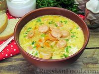 Фото к рецепту: Суп с квашеной капустой, сосисками и сметаной