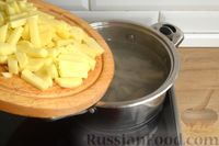 Фото приготовления рецепта: Сырный суп со свининой и картофелем - шаг №9