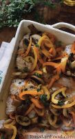 Фото к рецепту: Рыба, запеченная с грибами и овощами в духовке