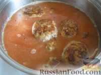 Фото приготовления рецепта: Тефтели с рисом  в томатном соусе - шаг №14