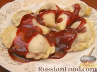 Фото приготовления рецепта: Украинские вареники с вишнями - шаг №15