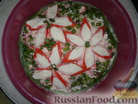 Фото к рецепту: Салат с помидорами и крабовыми палочками