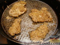 Фото приготовления рецепта: Отбивные котлеты в орехово-сырной панировке - шаг №11