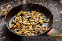 Фото приготовления рецепта: Рыба, запечённая с грибами, луком и кукурузой - шаг №11