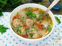 Фото приготовления рецепта: Суп с рисом, мясными фрикадельками и помидорами - шаг №16