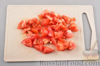 Фото приготовления рецепта: Рагу из куриного филе, с кабачками, молодой картошкой и помидорами - шаг №12