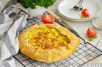 Фото к рецепту: Открытый пирог с сыром и варёными яйцами
