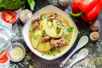 Фото к рецепту: Картофель, тушенный с куриными сердечками и печенью