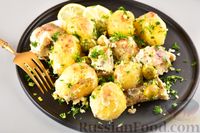 Фото к рецепту: Хек, запечённый с молодой картошкой и оливками