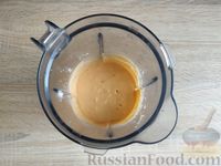 Фото приготовления рецепта: Абрикосовый смузи с апельсином и мороженым - шаг №9
