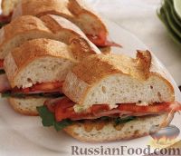 Фото к рецепту: Сэндвич из ветчины, помидоров и сыра
