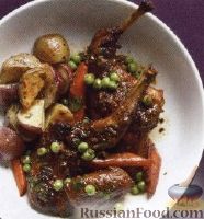 Фото к рецепту: Кролик, тушенный с морковкой