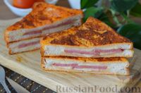 Фото к рецепту: Горячие сэндвичи с колбасой и сыром (на сковороде)