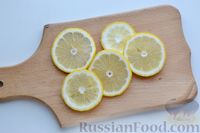 Фото приготовления рецепта: Компот из винограда с лимоном (на зиму) - шаг №7
