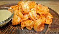 Фото к рецепту: Пикантные жареные креветки с чесноком (на сливочном масле)