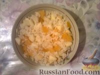 Фото приготовления рецепта: Сладкий рис с яблоками и мандаринами - шаг №4
