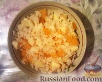 Фото к рецепту: Сладкий рис с яблоками и мандаринами