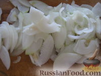 Фото приготовления рецепта: Салат «Нежинский» из огурцов на зиму - шаг №4