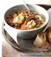 Фото к рецепту: Сливочный суп с грибами и артишоками