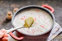 Фото приготовления рецепта: Рыбный суп с молоком, рисом и сыром - шаг №9