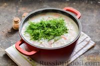 Фото приготовления рецепта: Рыбный суп с молоком, рисом и сыром - шаг №10