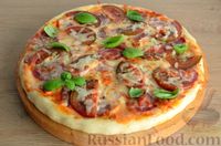 Фото приготовления рецепта: Пицца из дрожжевого теста длительного брожения, с копчёностями и помидорами - шаг №18