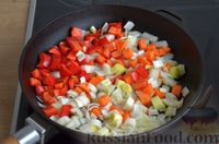 Фото приготовления рецепта: Куриные голени, тушенные с нутом и овощами - шаг №6