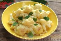 Фото к рецепту: Цветная капуста, жаренная с яйцами и сыром