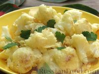 Фото приготовления рецепта: Цветная капуста, жаренная с яйцами и сыром - шаг №11