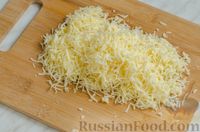 Фото приготовления рецепта: Рисовый рулет с шампиньонами, стручковой фасолью и сыром - шаг №10