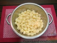 Фото приготовления рецепта: Запеканка из макарон с сосисками и сыром - шаг №4