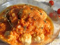 Фото приготовления рецепта: Рыбные тефтельки в томатном соусе - шаг №21
