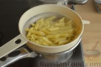 Фото приготовления рецепта: Макароны, запечённые с грибами в сметанно-чесночном соусе и сыром - шаг №9