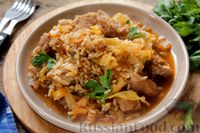 Фото к рецепту: Капуста, тушенная с мясом и рисом (на сковороде)