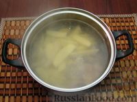 Фото приготовления рецепта: Щи из свежей капусты с пшеном и свининой - шаг №6