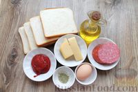 Фото приготовления рецепта: Сэндвичи с колбасой, сыром и томатной пастой, на сковороде - шаг №1