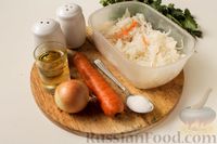 Фото приготовления рецепта: Запечённая квашеная капуста с морковью и луком - шаг №1