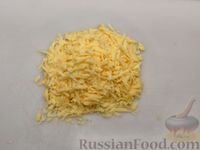 Фото приготовления рецепта: Картошка, запечённая с цветной капустой, сливками и сыром - шаг №6
