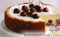 Фото к рецепту: Чизкейк с белым шоколадом и вишнями