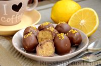 Фото к рецепту: Орехово-лимонные конфеты  с изюмом и кардамоном (в шоколаде)