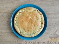 Фото приготовления рецепта: Заливной пирог с рисом, яйцами и зелёным луком - шаг №18